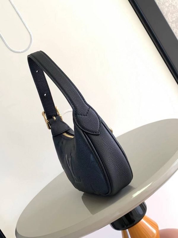 LOUIS VUITTON Mini Moon - Image 2